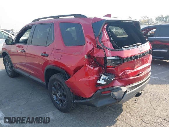 2023 Honda Pilot TrailSport with VIN 5FNYG1H65PB042687, listed as a IAAI auction lot 41259661 with 11,359 mi miles. Bid and sale history available at carsss.com. Image 3.