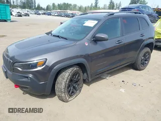 2019 Jeep Cherokee Trailhawk with VIN 1C4PJMBX2KD231734, listed as a IAAI auction lot 42235469 with 104,565 mi miles and . Bid and sale history available at DreamBid. Image 17.