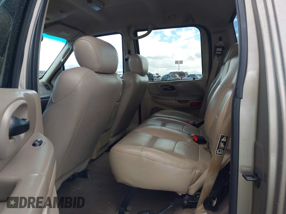 2003 Ford F-150 XLT with VIN 1FTRW07L53KD82167, listed as a IAAI auction lot 41745801 with 216,783 mi miles. Bid and sale history available at carsss.com. Image 8.