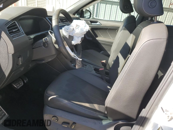 2023 Volkswagen Tiguan SE R-Line Black with VIN 3VVCB7AX6PM001044, listed as a Copart auction lot 47365565 with 20,059 mi miles and Salvage title. Bid and sale history available at DreamBid. Image 7.