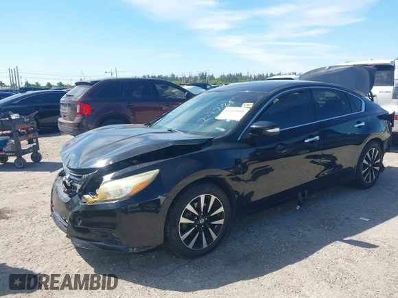 2018 Nissan Altima S with VIN 1N4AL3AP8JC109000, listed as a IAAI auction lot 41669061 with 238,560 mi miles and . Bid and sale history available at DreamBid. Image 2.