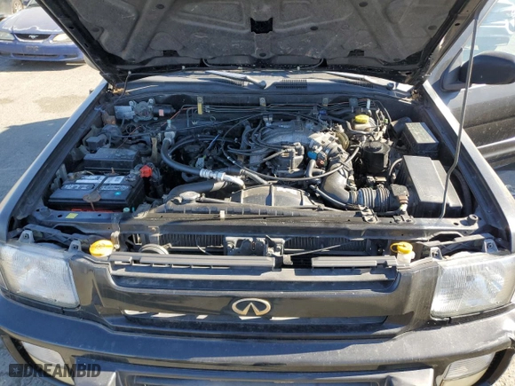 1999 Infiniti QX4 with VIN JNRAR05Y0XW050770, listed as a Copart auction lot 79668764 with 194699 miles and Clean Title. Bid and sale history available at carsss.com. Image 11.