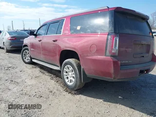 2019 GMC Yukon XL SLT with VIN 1GKS2GKC9KR341807, listed as a IAAI auction lot 41658848 with 68,204 mi miles. Bid and sale history available at carsss.com. Image 3.