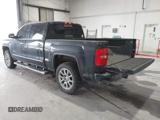 2015 GMC Sierra 1500 Denali z VIN 3GTU2WEJ8FG321045, wystawiony jako IAAI lot #41790541 z przebiegiem 239 945 mil mil oraz . Historia ofert i sprzedaży dostępna na DreamBid. Obrazek 3.