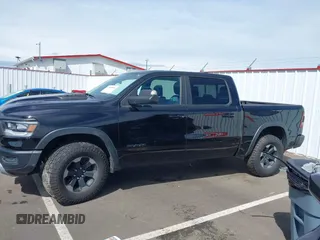 2019 Ram 1500 Rebel with VIN 1C6SRFLT2KN592652, listed as a IAAI auction lot 41989054 with 71,630 mi miles and . Bid and sale history available at DreamBid. Image 14.