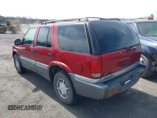 1998 GMC Jimmy SLT with VIN 1GKDT13W1W2521468, listed as a IAAI auction lot 41819921 with 161,931 mi miles. Bid and sale history available at carsss.com. Image 3.
