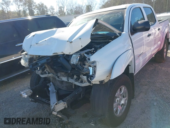 2014 Toyota Tacoma with VIN 5TFLU4EN1EX103052, listed as a IAAI auction lot 41653270 with 121,656 mi miles. Bid and sale history available at carsss.com. Image 6.