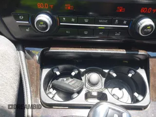2013 BMW 5 Series 528i xDrive with VIN WBAXH5C57DD114603, listed as a IAAI auction lot 42592212 with 133,058 mi miles and . Bid and sale history available at DreamBid. Image 11.