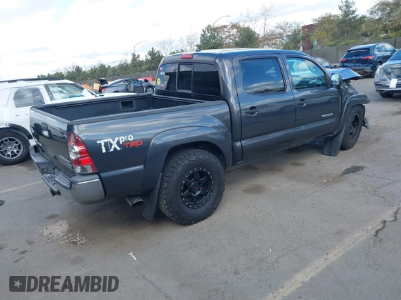 2011 Toyota Tacoma PreRunner with VIN 3TMJU4GN9BM110241, listed as a IAAI auction lot 41516056 with 181,951 mi miles and . Bid and sale history available at DreamBid. Image 4.