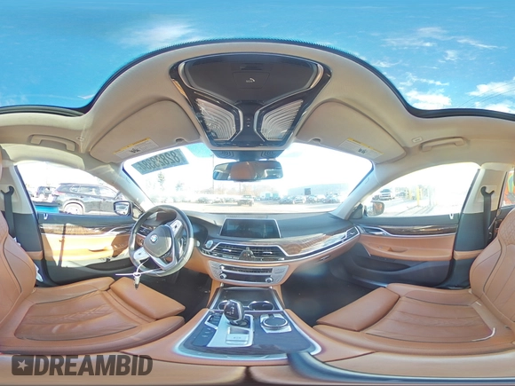 2020 BMW 7 Series 740i xDrive with VIN WBA7T4C04LCD18344, listed as a Copart auction lot 82823384 with Not provided miles and Salvage title. Bid and sale history available at DreamBid. Image 13.
