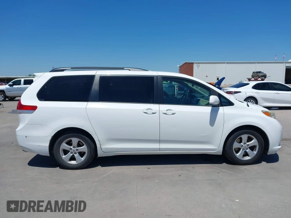 2011 Toyota Sienna LE AAS with VIN 5TDKK3DC1BS150109, listed as a IAAI auction lot 42067808 with 186,811 mi miles and . Bid and sale history available at DreamBid. Image 14.