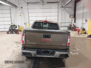 2016 GMC Canyon 4WD SLT z VIN 1GTP6DE13G1229783, wystawiony jako IAAI lot #41583360 z przebiegiem 80 149 mil mil oraz . Historia ofert i sprzedaży dostępna na DreamBid. Obrazek 17.