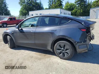 2024 Tesla Model Y Long Range with VIN 7SAYGDEE9RF120729, listed as a Copart auction lot 57360265 with 21,589 mi miles and Salvage title. Bid and sale history available at DreamBid. Image 2.