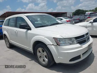 2013 Dodge Journey Canada Value z VIN 3C4PDCAB0DT594876, wystawiony jako IAAI lot #42569090 z przebiegiem 217 547 mil mil oraz . Historia ofert i sprzedaży dostępna na DreamBid. Obrazek 1.