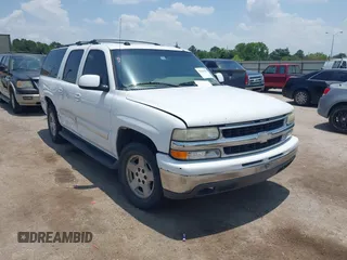 2005 Chevrolet Suburban LS z VIN 3GNEC16Z35G279673, wystawiony jako IAAI lot #42428085 z przebiegiem 290 108 mil mil oraz . Historia ofert i sprzedaży dostępna na DreamBid. Obrazek 1.
