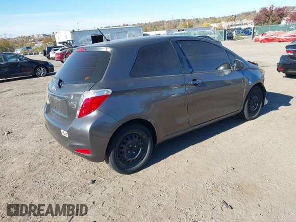 2013 Toyota Yaris L with VIN JTDJTUD33DD550976, listed as a IAAI auction lot 40691482 with 149,614 mi miles. Bid and sale history available at carsss.com. Image 4.