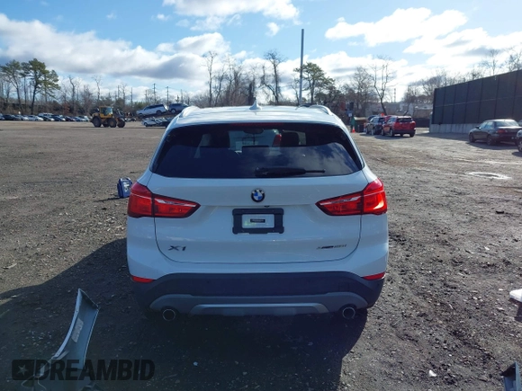 2018 BMW X1 xDrive28i with VIN WBXHT3C34J5L29714, listed as a IAAI auction lot 41825126 with 89,970 mi miles. Bid and sale history available at carsss.com. Image 16.