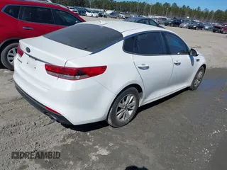 2016 Kia Optima LX with VIN KNAGT4L39G5073865, listed as a IAAI auction lot 41675211 with 120,751 mi miles. Bid and sale history available at carsss.com. Image 4.