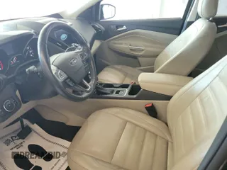 2019 Ford Escape Titanium with VIN 1FMCU9J96KUA01051, listed as a IAAI auction lot 42841649 with 69,720 mi miles and . Bid and sale history available at DreamBid. Image 31.