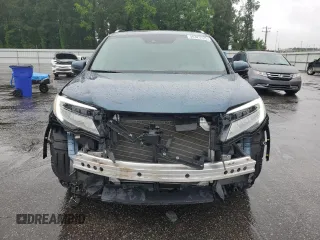 2022 Honda Pilot Touring 7-Passenger z VIN 5FNYF5H63NB015091, wystawiony jako Copart lot #56323725 z przebiegiem 28 614 mil mil oraz Szkoda całkowita • Salvage title. Historia ofert i sprzedaży dostępna na DreamBid. Obrazek 5.