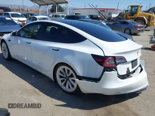 2022 Tesla Model 3 with VIN 5YJ3E1EA3NF294282, listed as a IAAI auction lot 41992046 with 22,383 mi miles. Bid and sale history available at carsss.com. Image 3.