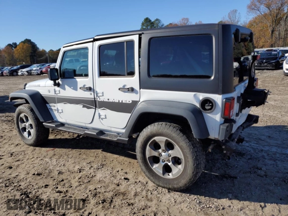 2018 Jeep Wrangler JK Unlimited Sport S with VIN 1C4BJWDG2JL879078, listed as a Copart auction lot 84290864 with 24,457 mi miles and Salvage Title. Bid and sale history available at carsss.com. Image 2.