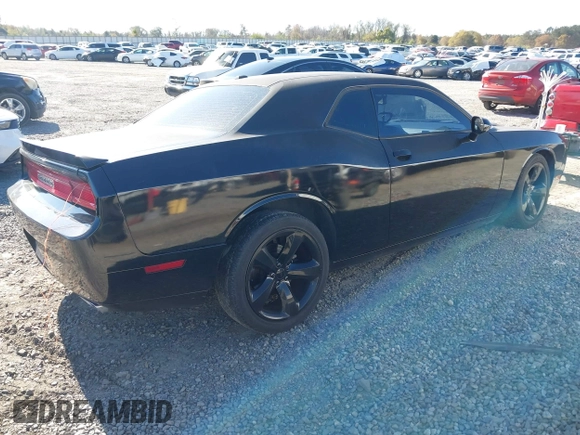 2014 Dodge Challenger R/T Plus z VIN 2C3CDYBT2EH274265, wystawiony jako IAAI lot #41845052 z przebiegiem 120 290 mil mil oraz . Historia ofert i sprzedaży dostępna na DreamBid. Obrazek 4.