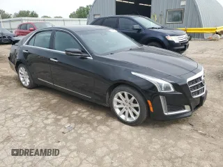 2014 Cadillac CTS Luxury AWD with VIN 1G6AX5S35E0190361, listed as a Copart auction lot 54497655 with 32,664 mi miles and Salvage title. Bid and sale history available at DreamBid. Image 4.