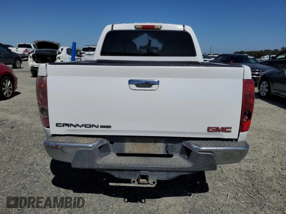 2010 GMC Canyon SLE1 z VIN 1GTDSCDE0A8110892, wystawiony jako Copart lot #70887924 z przebiegiem 96 470 mil mil oraz Szkoda całkowita • Salvage title. Historia ofert i sprzedaży dostępna na DreamBid. Obrazek 6.