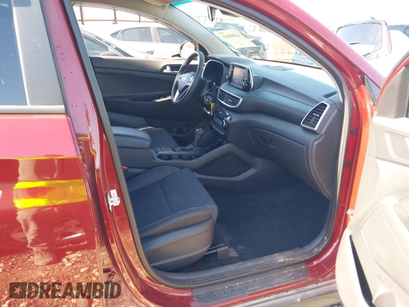 2019 Hyundai Tucson SE with VIN KM8J2CA41KU926156, listed as a IAAI auction lot 41888461 with 91,094 mi miles. Bid and sale history available at carsss.com. Image 5.