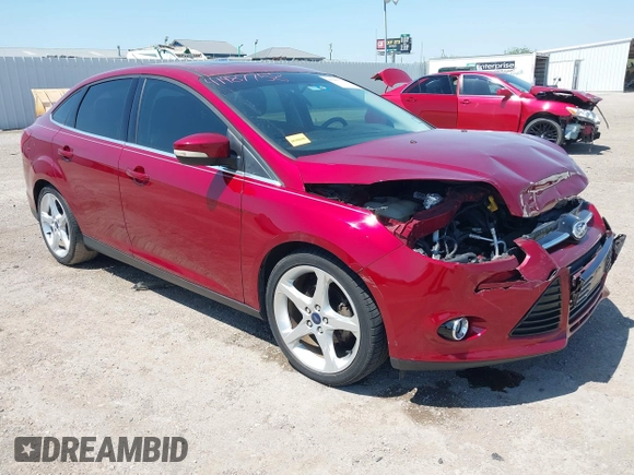 2013 Ford Focus Titanium with VIN 1FADP3J23DL334161, listed as a IAAI auction lot 41987758 with 117,665 mi miles and . Bid and sale history available at carsss.com. Image 1.