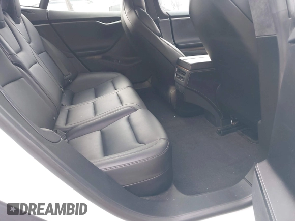 2018 Tesla Model S 75D with VIN 5YJSA1E23JF271465, listed as a IAAI auction lot 41911356 with 50,483 mi miles and . Bid and sale history available at DreamBid. Image 8.
