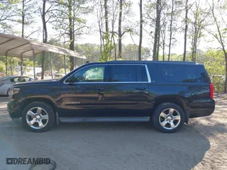 2015 Chevrolet Suburban LT with VIN 1GNSKJKC0FR238524, listed as a IAAI auction lot 42046889 with 179,676 mi miles. Bid and sale history available at carsss.com. Image 14.