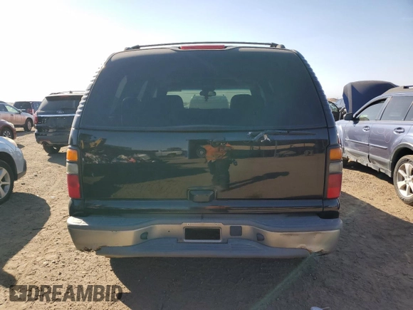 2004 GMC Yukon SLT with VIN 1GKEK13Z24J311546, listed as a Copart auction lot 73772714 with 252,403 mi miles and Salvage Title. Bid and sale history available at carsss.com. Image 6.