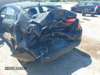 2013 Kia Rio EX with VIN KNADN4A32D6119638, listed as a IAAI auction lot 42313287 with 133,459 mi miles and . Bid and sale history available at DreamBid. Image 6.