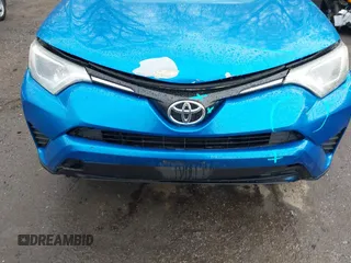 2016 Toyota RAV4 LE with VIN JTMBFREV9GJ100635, listed as a IAAI auction lot 41858669 with 171,644 mi miles. Bid and sale history available at carsss.com. Image 6.