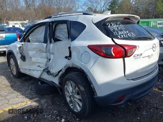 2013 Mazda CX-5 Grand Touring with VIN JM3KE2DE2D0122805, listed as a IAAI auction lot 41201502 with 178,833 mi miles. Bid and sale history available at carsss.com. Image 3.