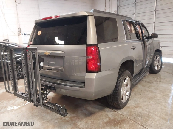 2017 Chevrolet Tahoe LT with VIN 1GNSCBKC8HR397846, listed as a IAAI auction lot 41549432 with 96,952 mi miles. Bid and sale history available at carsss.com. Image 4.