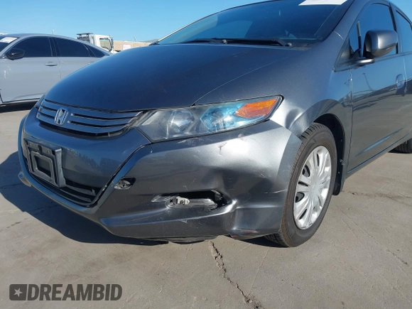 2010 Honda Insight LX with VIN JHMZE2H50AS019740, listed as a IAAI auction lot 41665527 with 74,022 mi miles and . Bid and sale history available at DreamBid. Image 6.