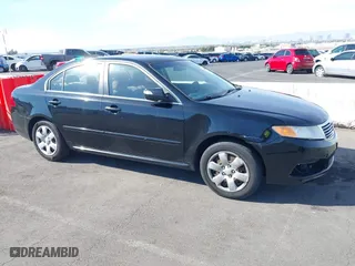 2009 Kia Optima LX with VIN KNAGE228895356658, listed as a IAAI auction lot 41580009 with 216,534 mi miles. Bid and sale history available at carsss.com. Image 13.
