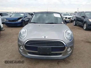 2016 MINI Convertible z VIN WMWWG5C51G3A81075, wystawiony jako IAAI lot #41681717 z przebiegiem 54 956 mil mil oraz . Historia ofert i sprzedaży dostępna na DreamBid. Obrazek 12.