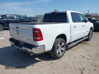 2023 Ram 1500 Laramie with VIN 1C6SRFJT0PN508550, listed as a IAAI auction lot 41913849 with 57,765 mi miles and . Bid and sale history available at DreamBid. Image 4.