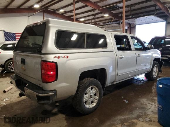 2017 Chevrolet Silverado 1500 LT with VIN 3GCUKREC3HG320455, listed as a Copart auction lot 43765005 with 119,683 mi miles and Salvage Title. Bid and sale history available at DreamBid. Image 3.