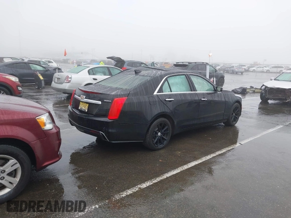 2017 Cadillac CTS AWD with VIN 1G6AW5SX1H0192666, listed as a IAAI auction lot 41554014 with 90,753 mi miles and . Bid and sale history available at DreamBid. Image 4.