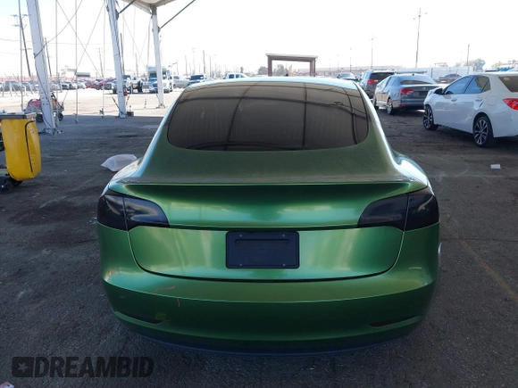 2020 Tesla Model 3 Standard Range Plus with VIN 5YJ3E1EA4LF799650, listed as a IAAI auction lot 41817538 with 54,835 mi miles. Bid and sale history available at carsss.com. Image 16.