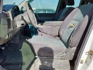 2007 Nissan Titan LE with VIN 1N6BA06AX7N242455, listed as a Copart auction lot 61811175 with 211,040 mi miles and Salvage title. Bid and sale history available at DreamBid. Image 7.