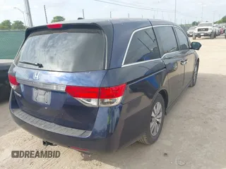 2015 Honda Odyssey EX-L z VIN 5FNRL5H62FB008681, wystawiony jako IAAI lot #42060381 z przebiegiem 128 372 mil mil oraz . Historia ofert i sprzedaży dostępna na DreamBid. Obrazek 4.