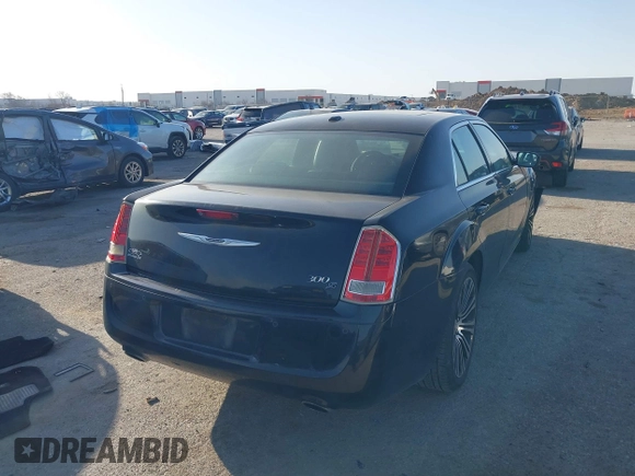 2013 Chrysler 300 with VIN 2C3CCABG7DH573164, listed as a IAAI auction lot 41851066 with 218,234 mi miles. Bid and sale history available at carsss.com. Image 4.