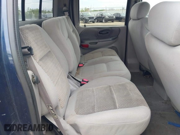 2003 Ford F-150 XLT with VIN 1FTRW08L63KD55851, listed as a IAAI auction lot 42359388 with Not provided miles and . Bid and sale history available at DreamBid. Image 8.
