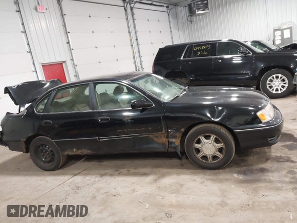 1998 Toyota Avalon XL with VIN 4T1BF18B5WU229340, listed as a IAAI auction lot 41957632 with 212,657 mi miles and . Bid and sale history available at DreamBid. Image 13.